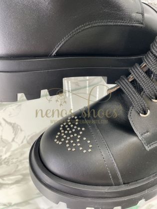 Botas Confetti tachas pala