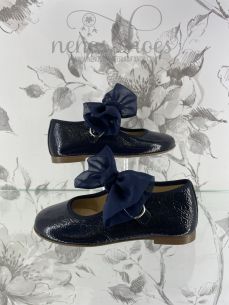 Merceditas Landos flor o lazo 2